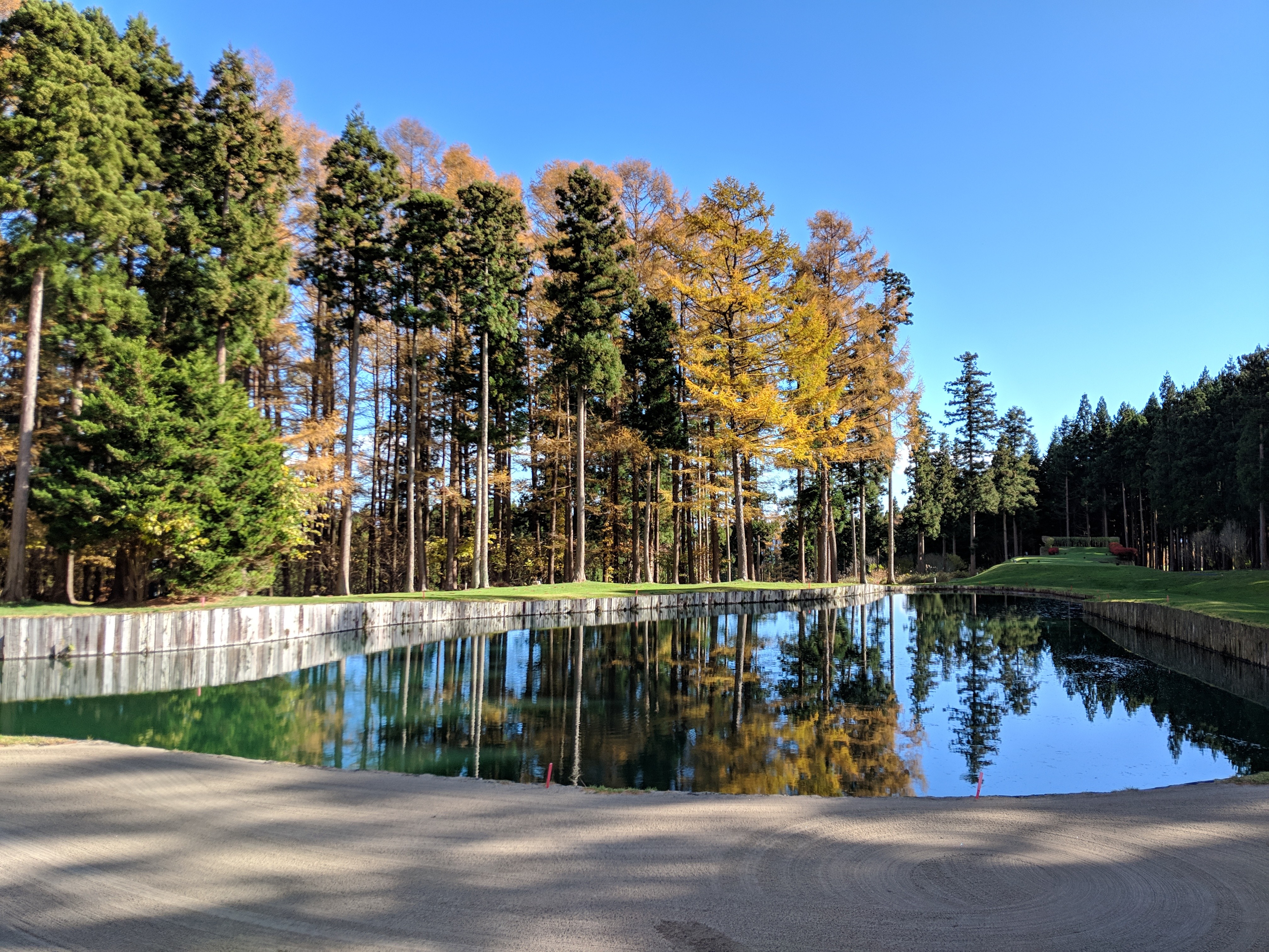 One of the well maintained lakes and bunkers around the course